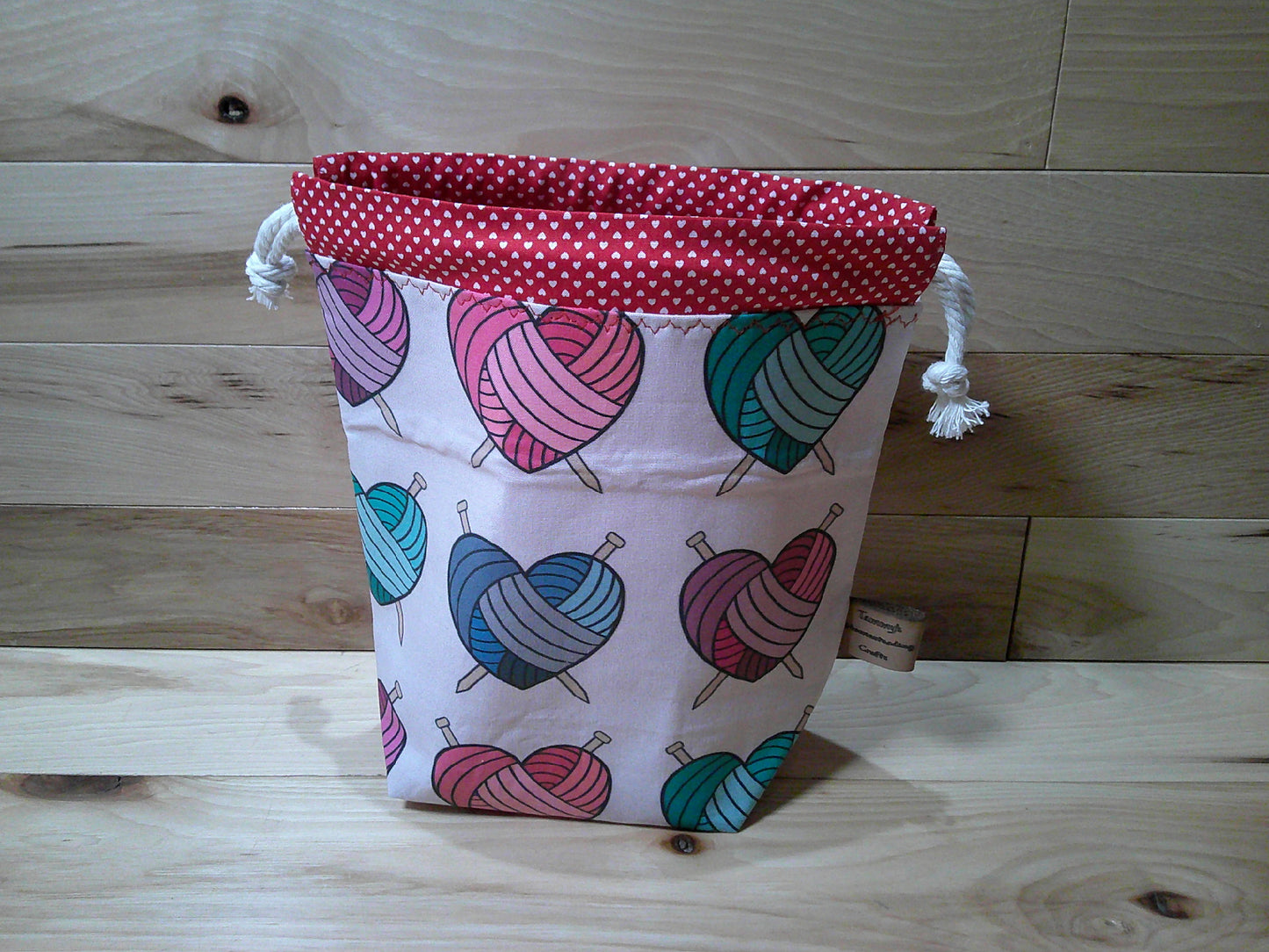 Heart yarn balls w/ knitting needles project bags