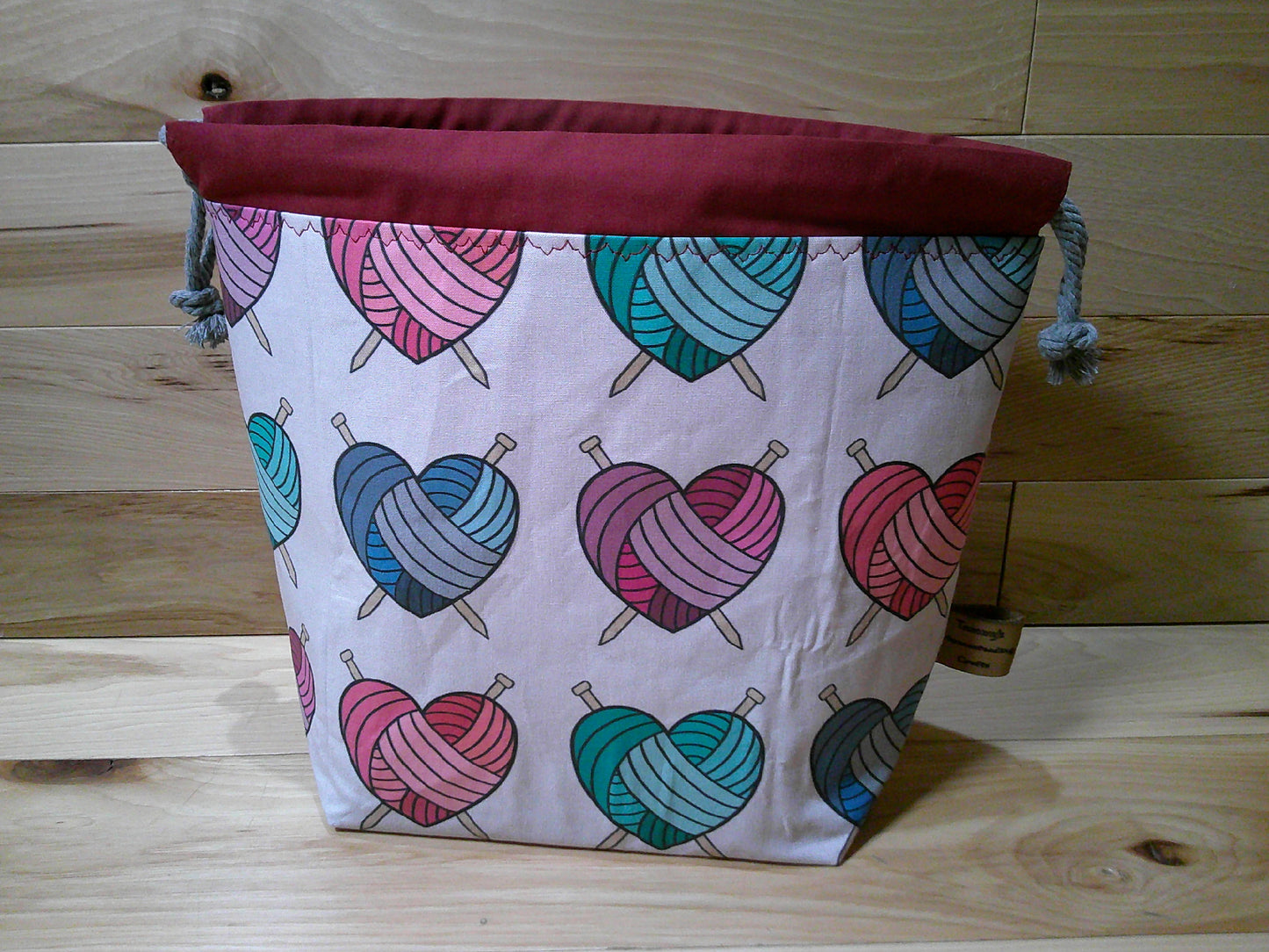 Heart yarn balls w/ knitting needles project bags