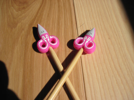 Scissor stitch stoppers