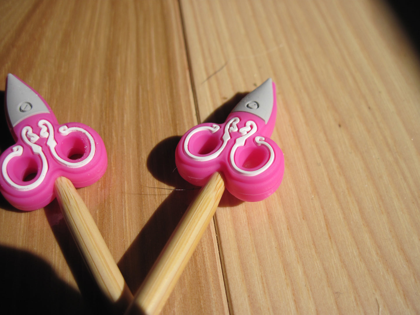 Scissor stitch stoppers