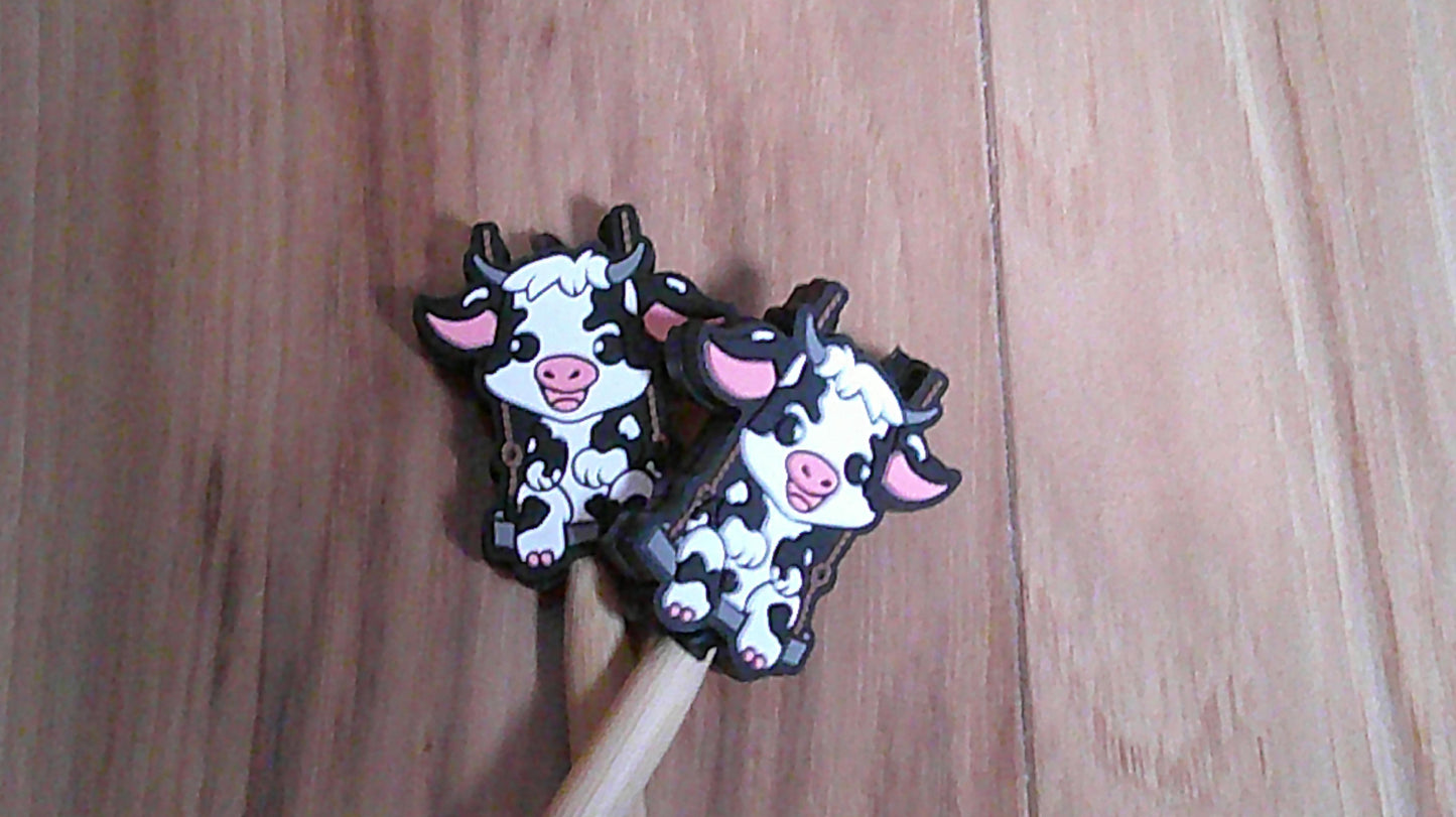 Cow on swing ~ stitch stoppers