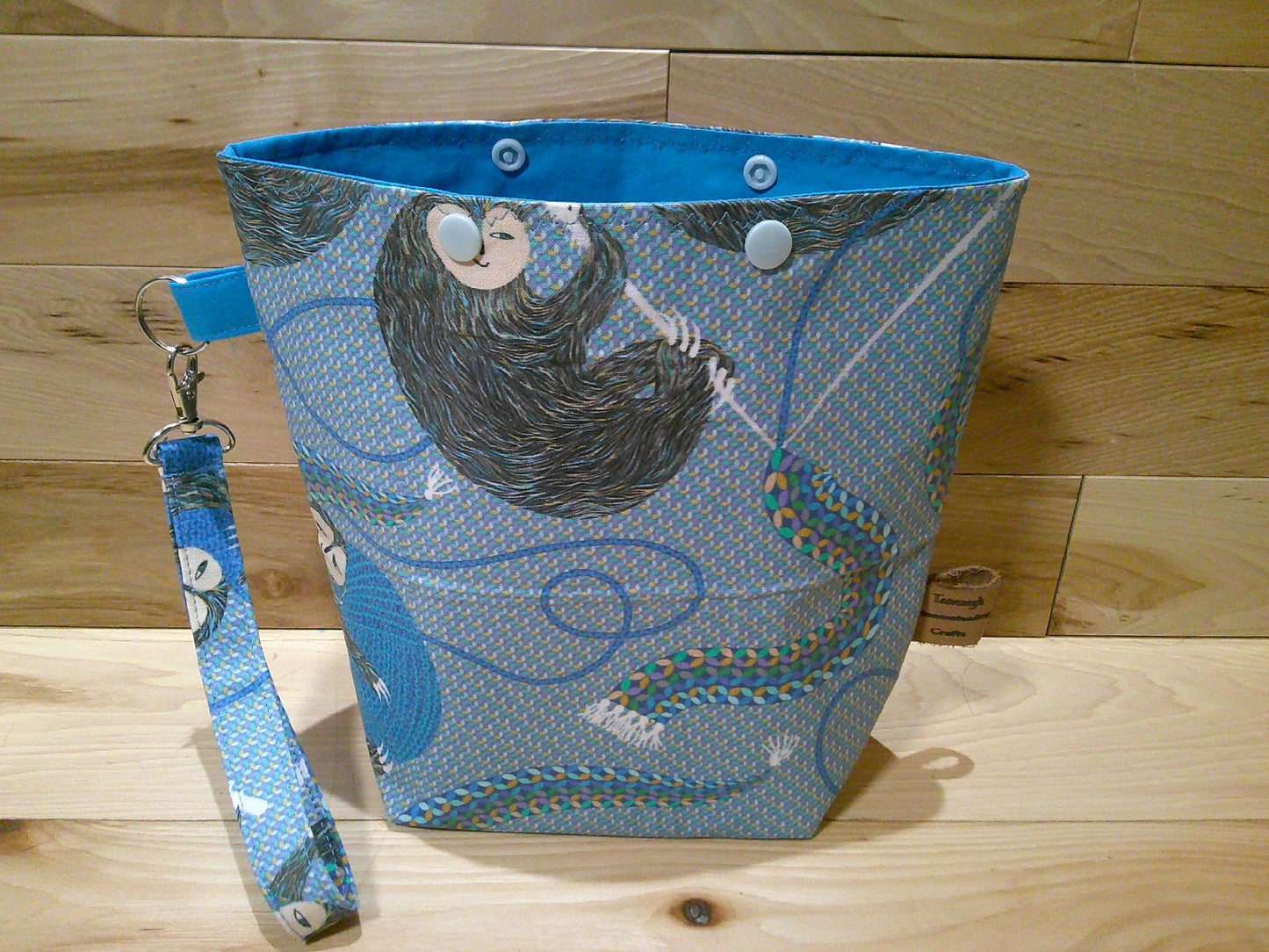 Knitting Sloth w/ bright blue project bags